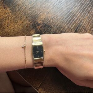 Seiko vintage gold and black watch, 1980s, functional, adjustable